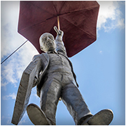Slight Uncertainty - Hanging Umbrella Man, © Arno Lucas