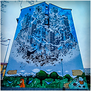 Een gebouw met een mooie muurschildering, © Arno Lucas